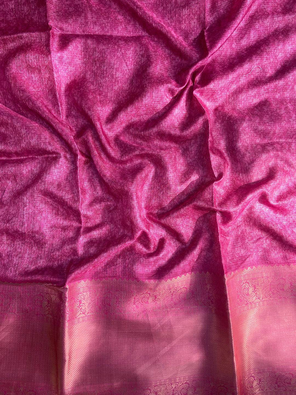 Textured pink fabric of Blue Kota Doriya saree with gold zari border