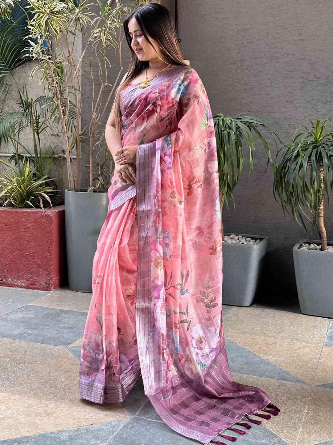 Charming floral print saree with traditional zari chex