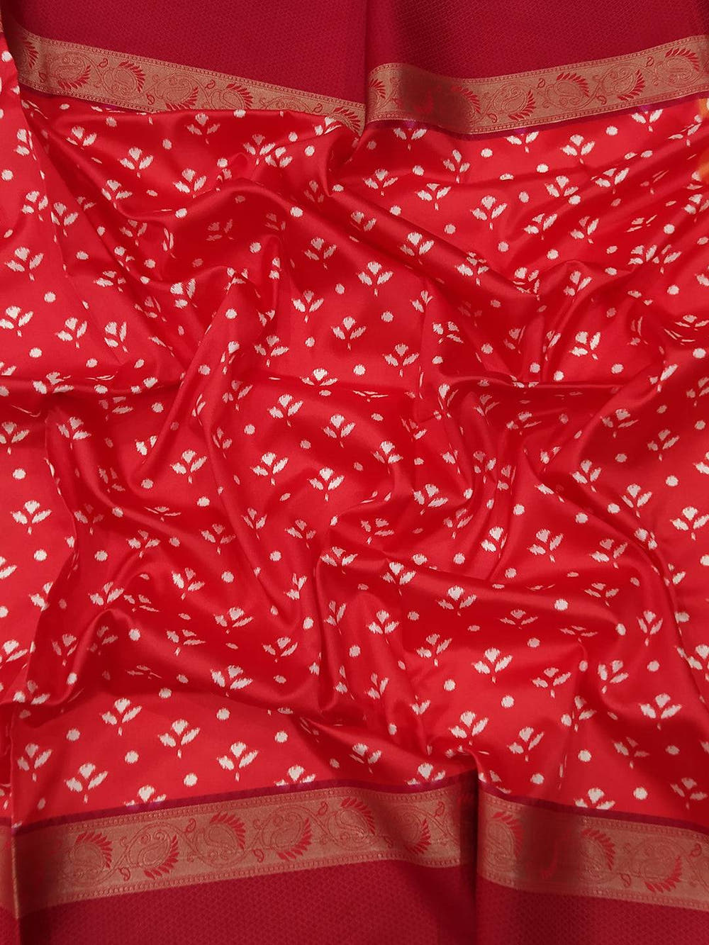 Red soft silk saree with intricate Gadwal border design