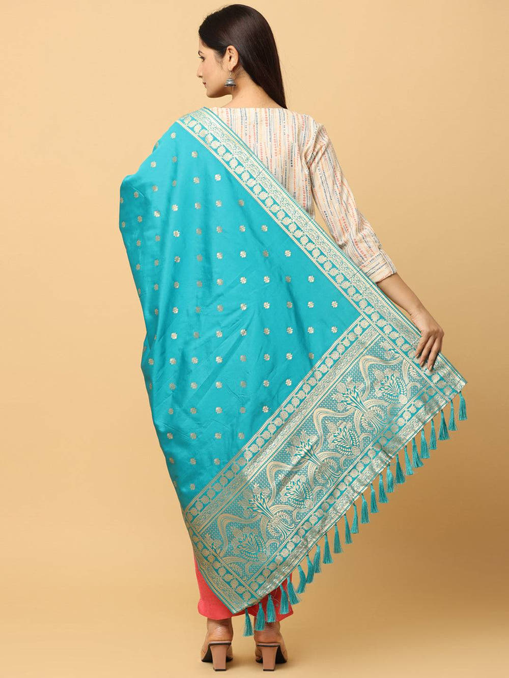 Back view of turquoise dupatta with intricate woven patterns