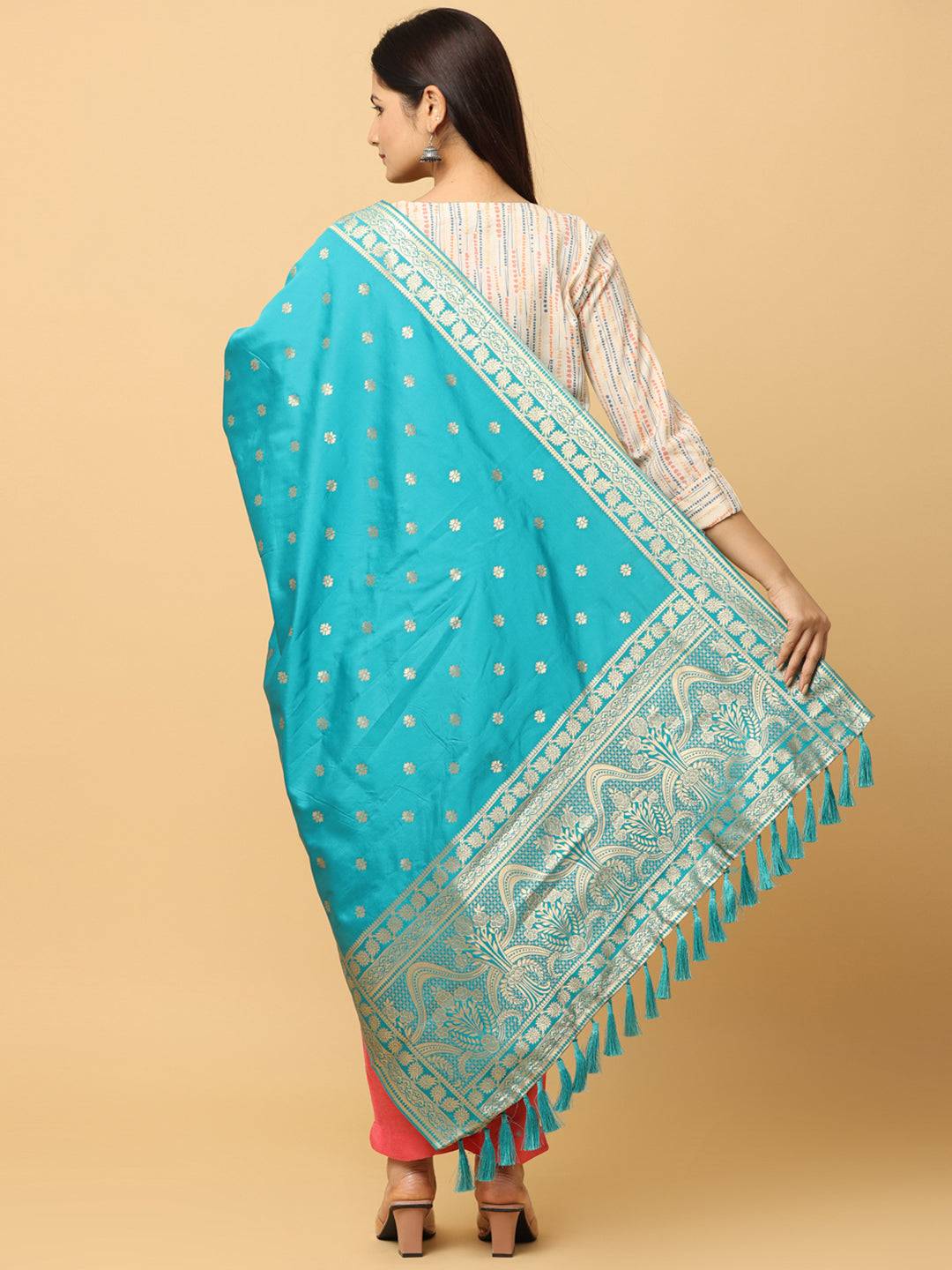 Back view of turquoise dupatta with intricate woven patterns