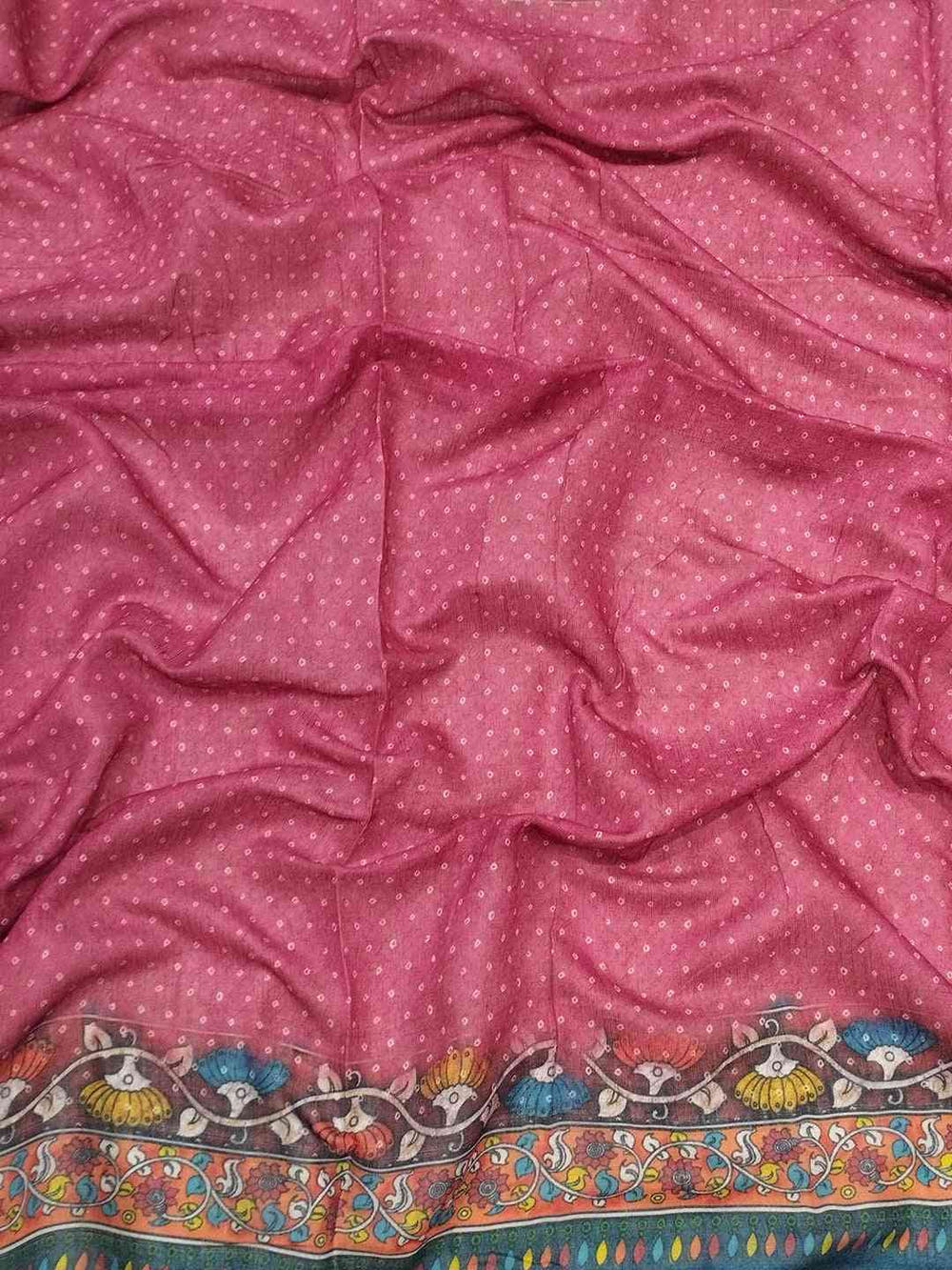 Close-up of pink Bandhej Kalamkari Saree fabric