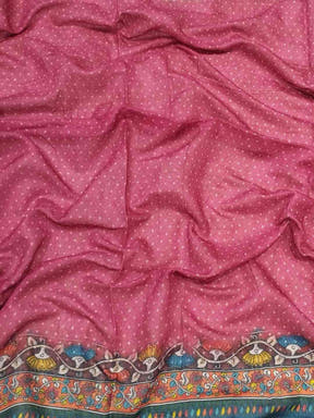Close-up of pink Bandhej Kalamkari Saree fabric