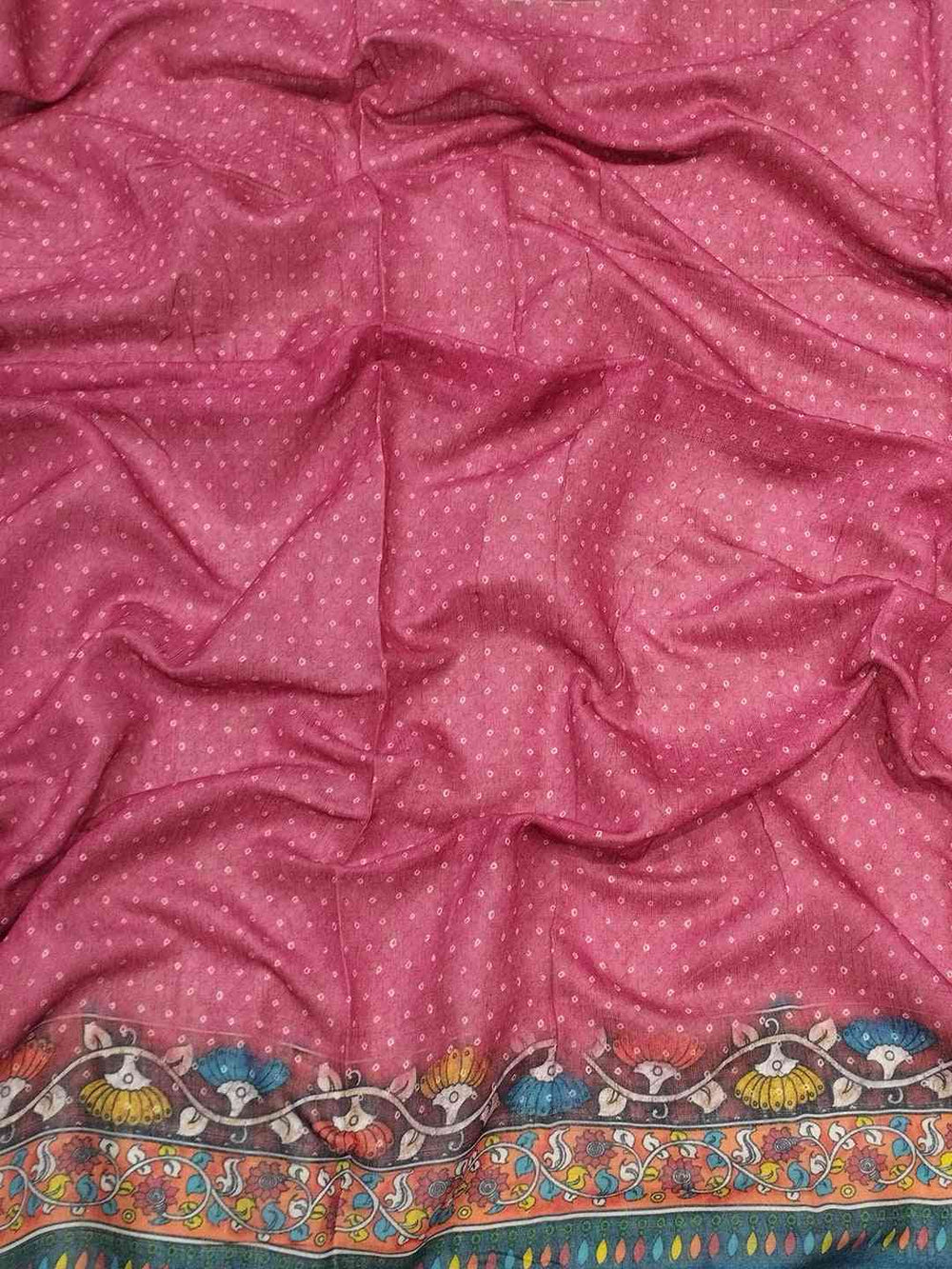 Close-up of pink Bandhej Kalamkari Saree fabric