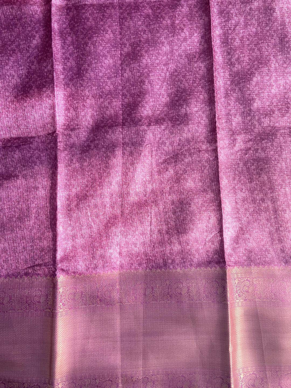 Plain lavender fabric with subtle zari border detail