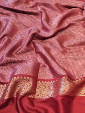 Rich red Banarasi silk fabric with golden border detail