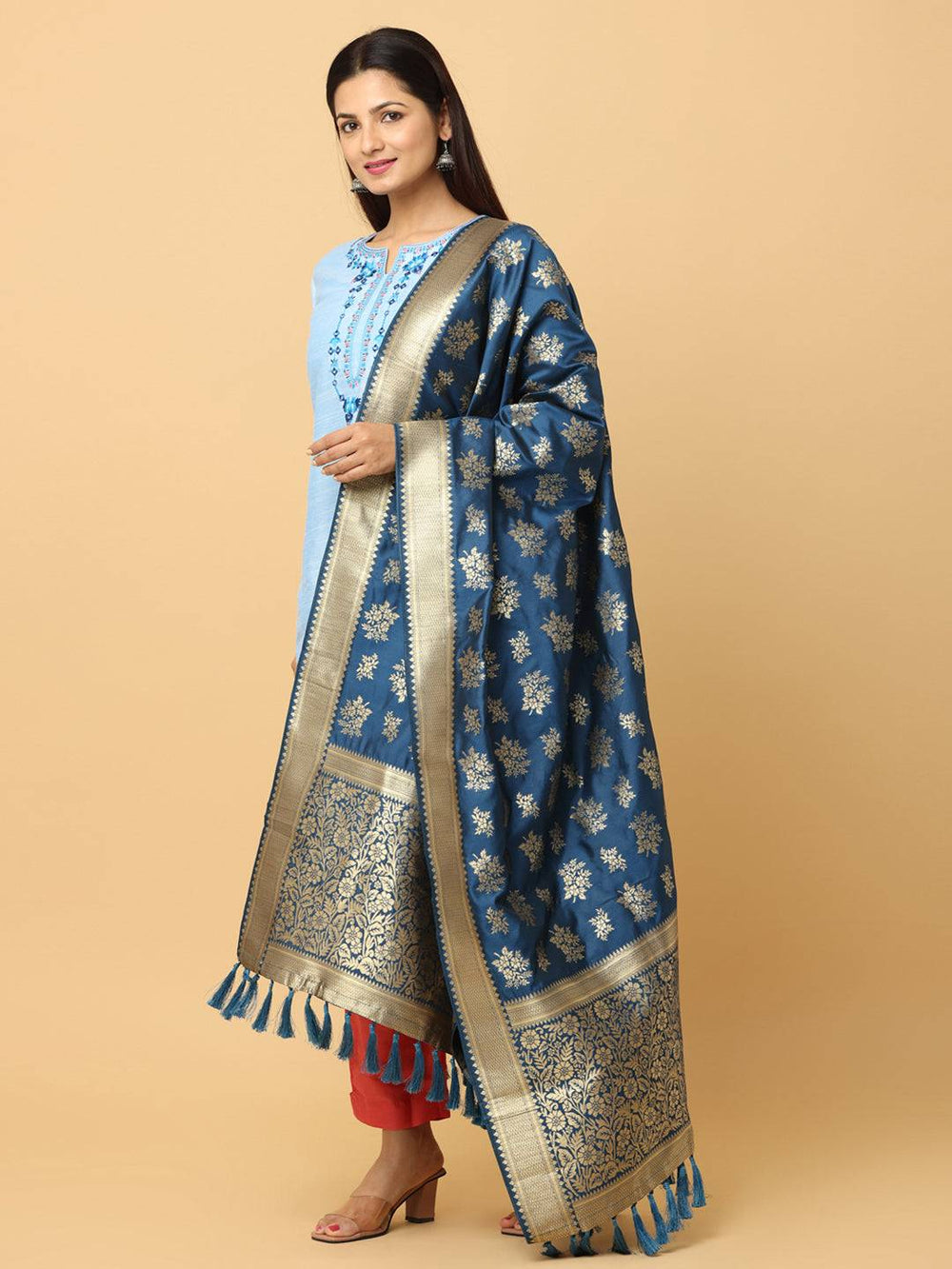 Elegant teal silk blend dupatta draped over shoulder