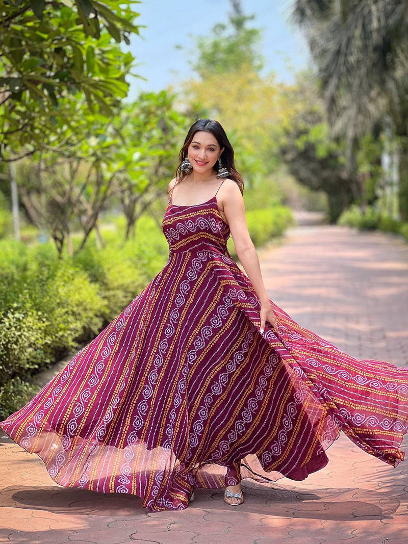 Wine Bandhej Printed Dress flowing elegantly outdoors