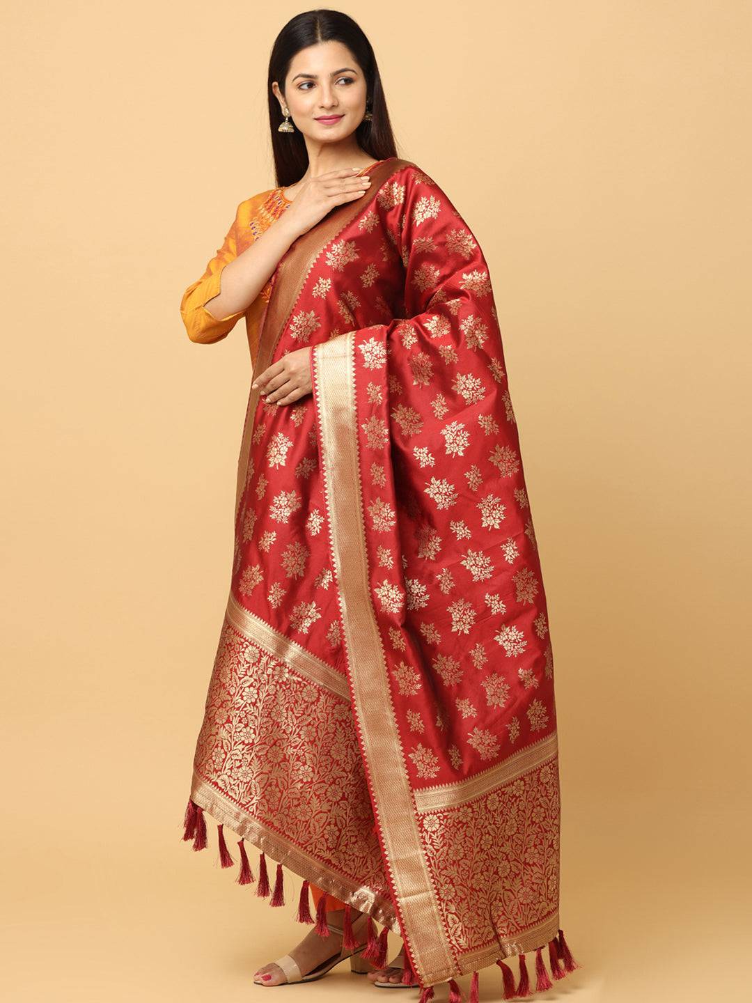 Model showcasing red silk blend dupatta with tassels