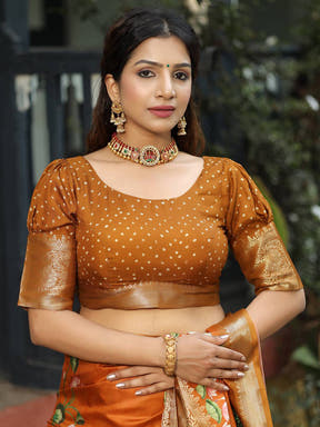 Viscose Dola Silk Orange Saree with Floral and Mughal Print