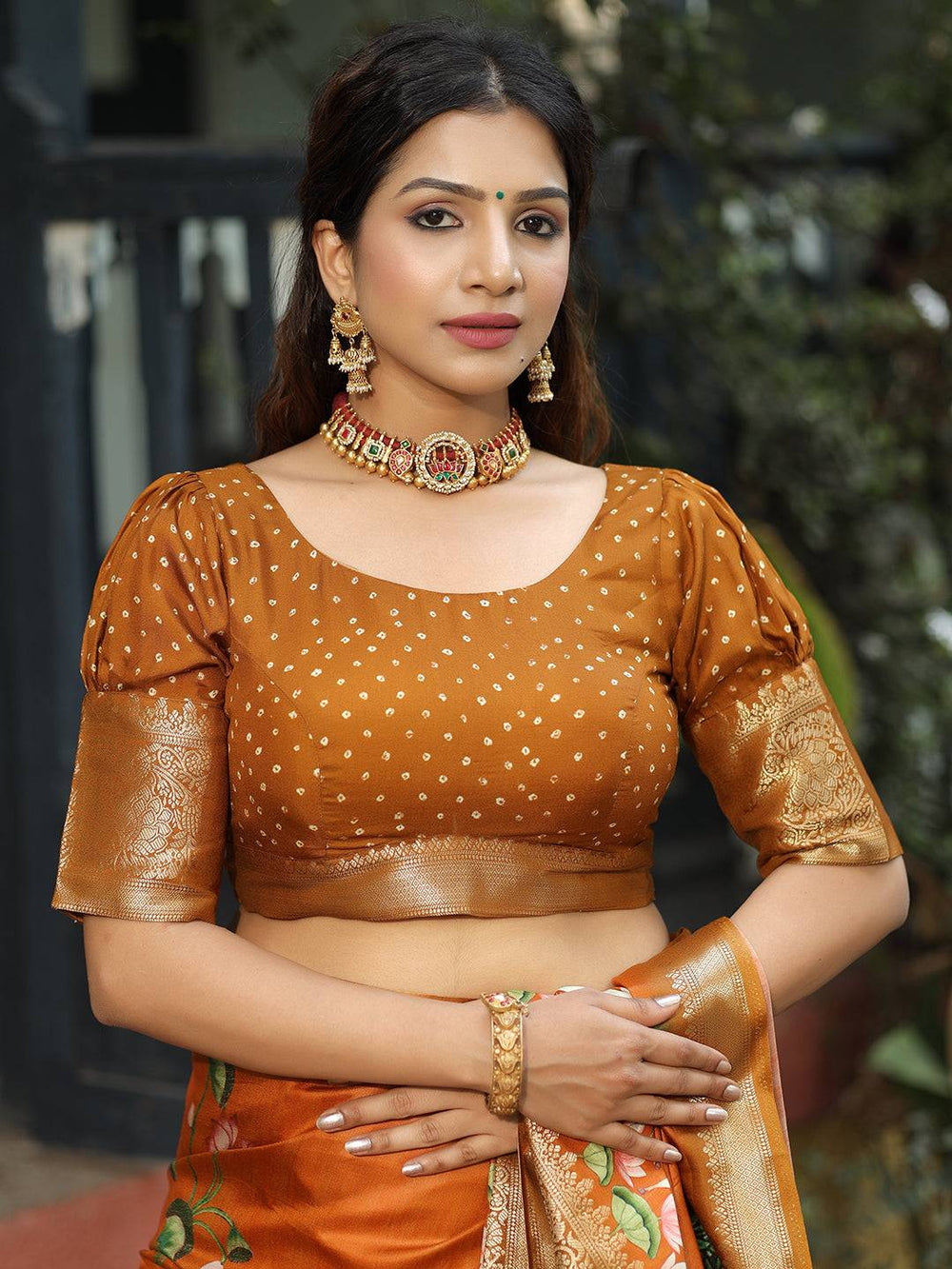 Viscose Dola Silk Orange Saree with Floral and Mughal Print