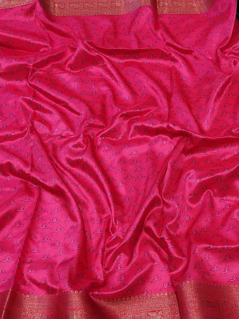 Rich red soft silk saree fabric with subtle patterns