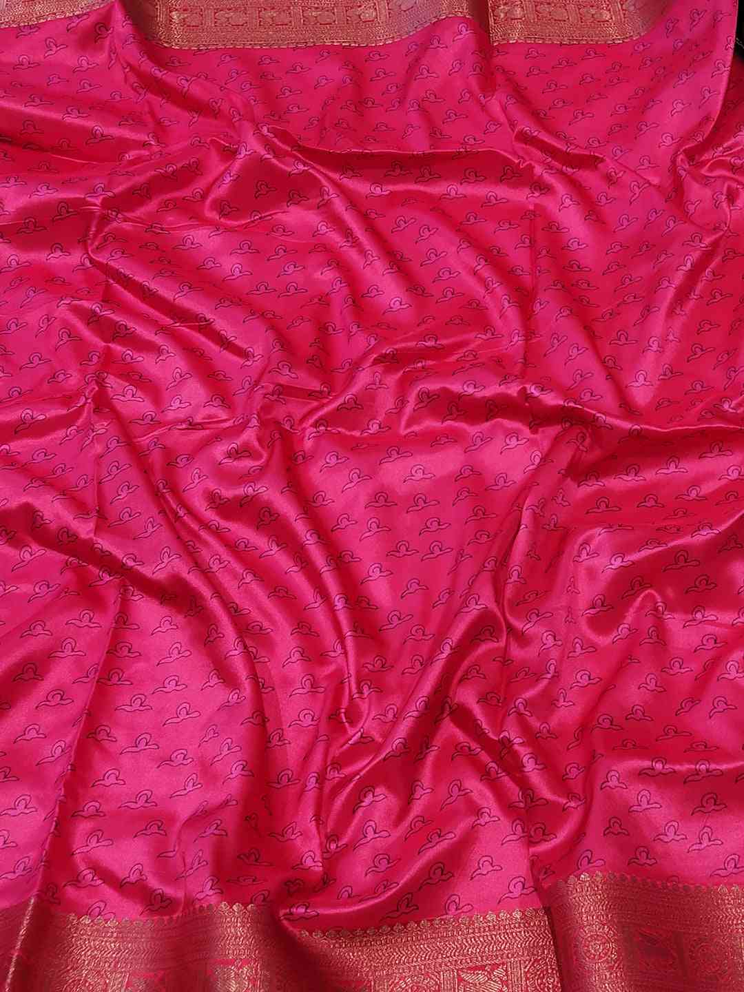 Rich red soft silk saree fabric with subtle patterns