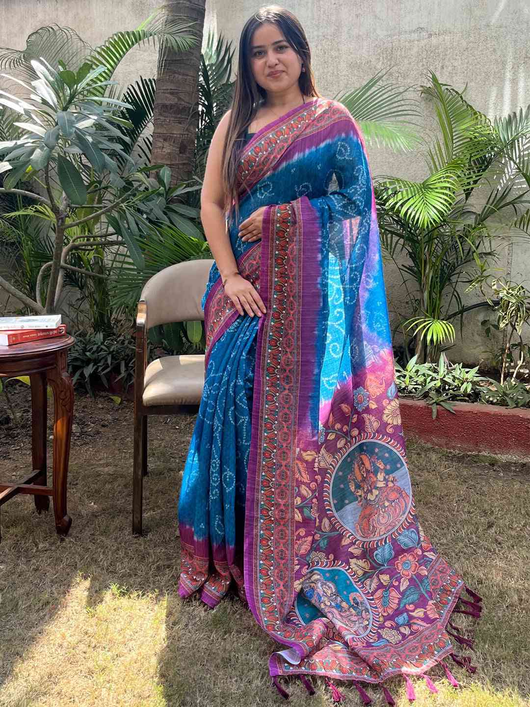 Standing pose in blue linen saree with Bandhej and Kalamkari print