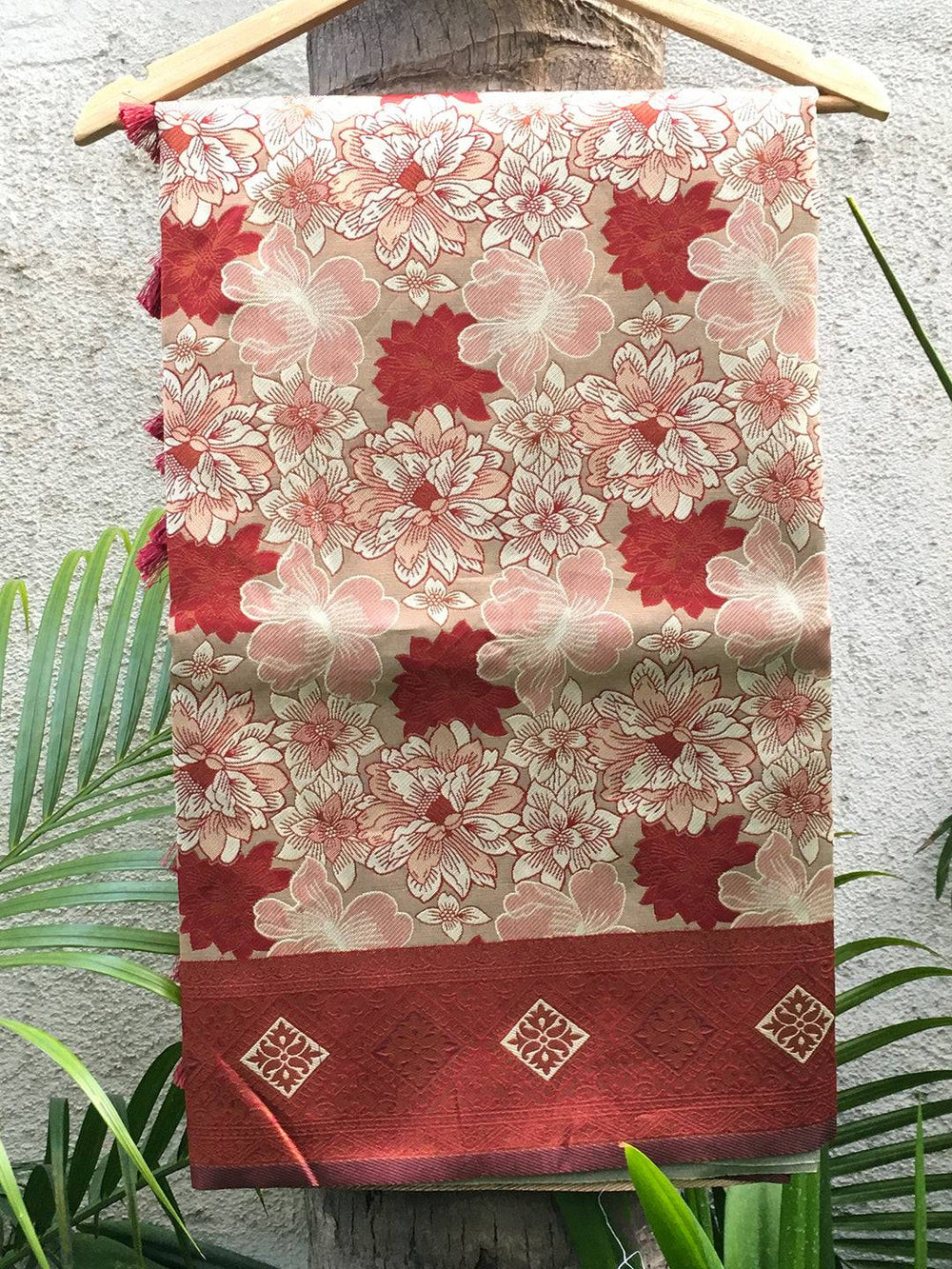 Close-up of Oyster Cream Soft Silk Butta Weaving Saree fabric.