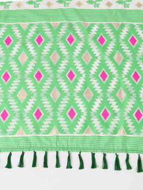 Close-up of green and pink geometric design on Jamdani saree