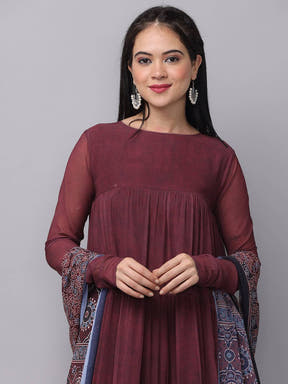 Close-up of mulberry dress with floral dupatta