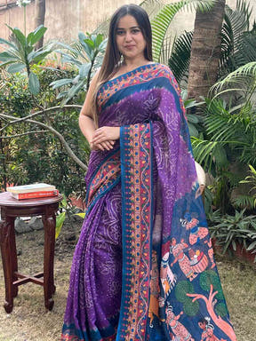 Purple linen saree featuring Bandhej and Kalamkari print, outdoor