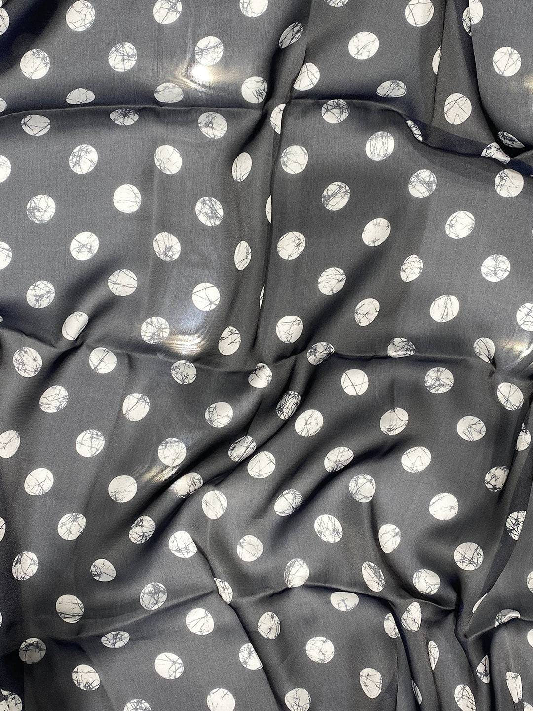 Close-up of fabric with circular patterns