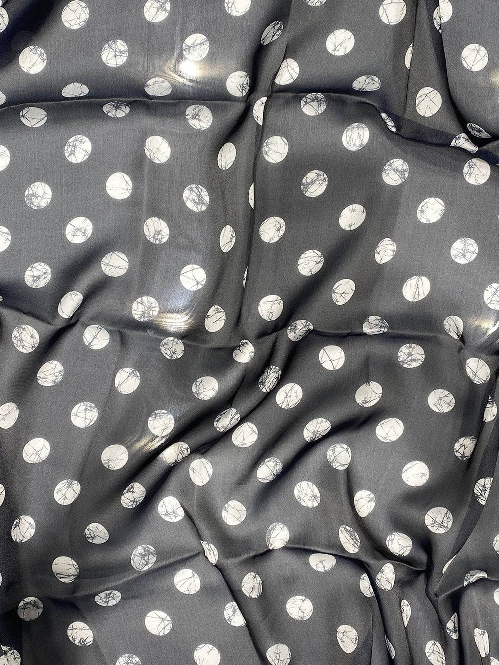Close-up of fabric with circular patterns