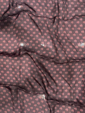 Close-up of fabric with small floral pattern