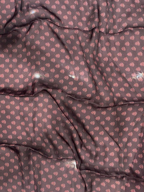 Close-up of fabric with small floral pattern
