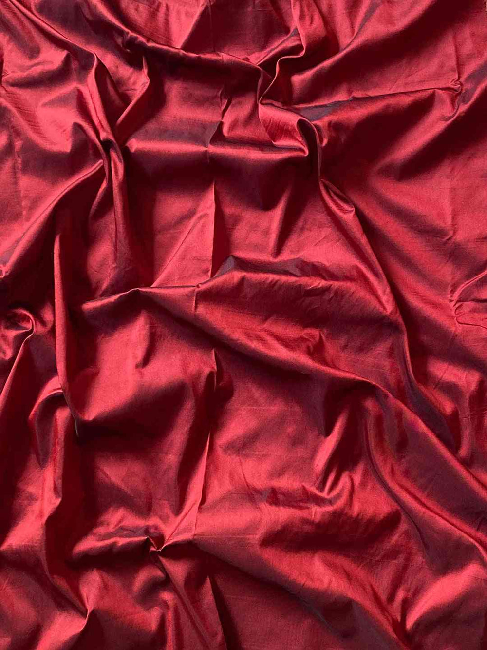 Rich red fabric with smooth texture