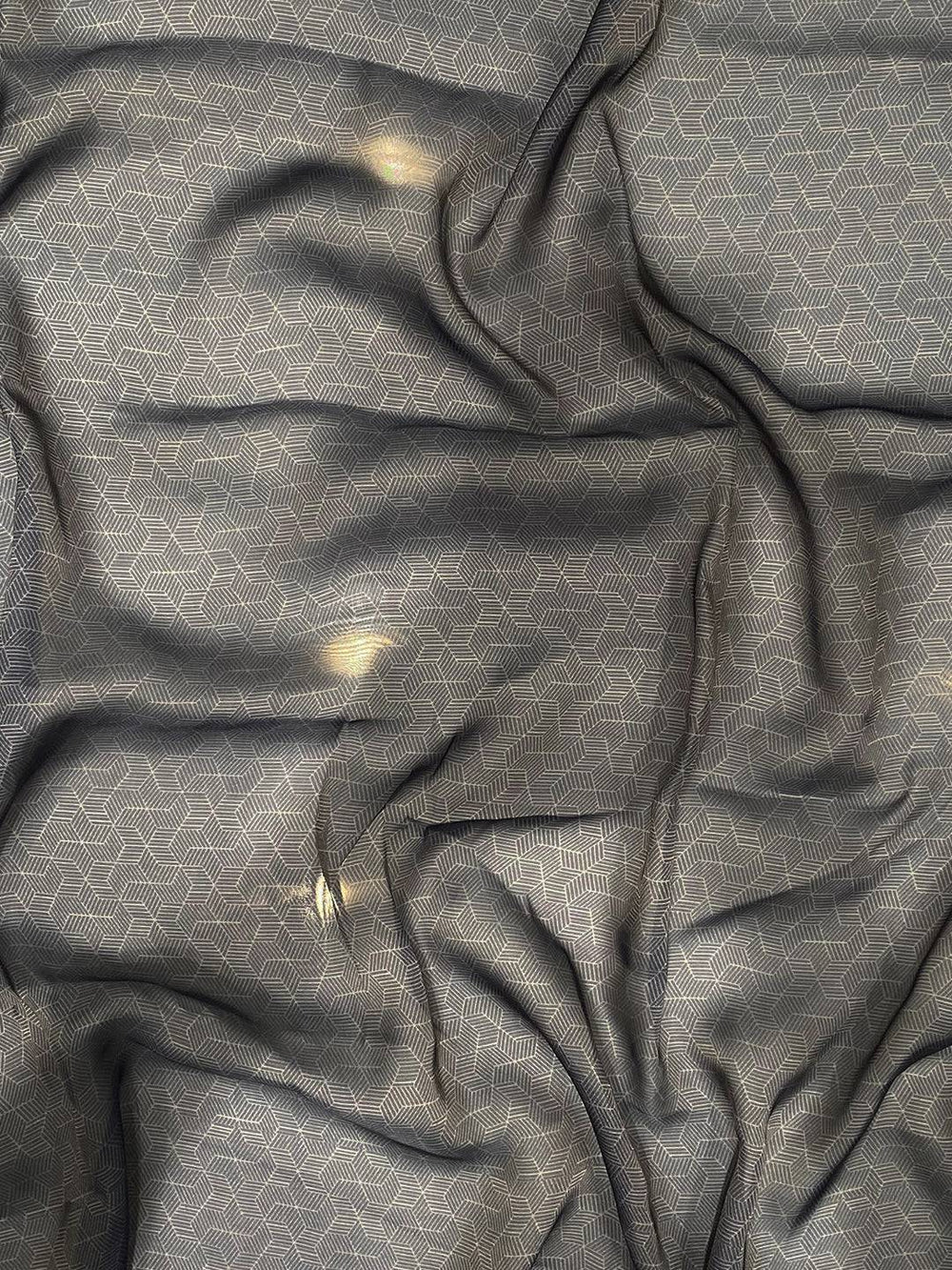 Textured fabric detail of Navy Batik Print Saree