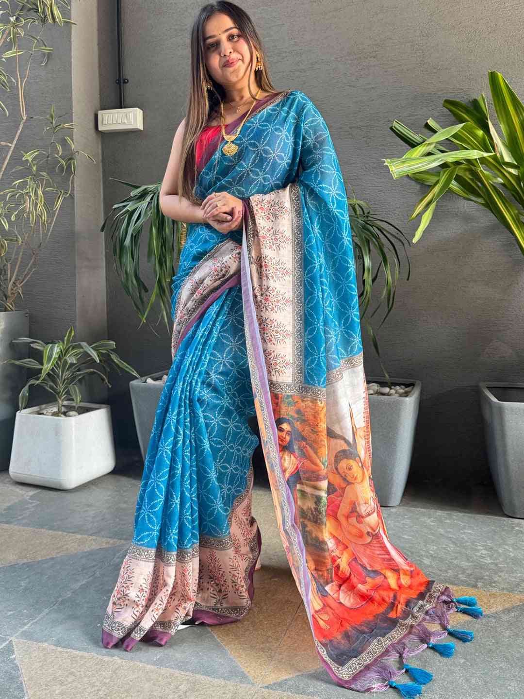 Elegant blue saree with kalamkari design, model front view