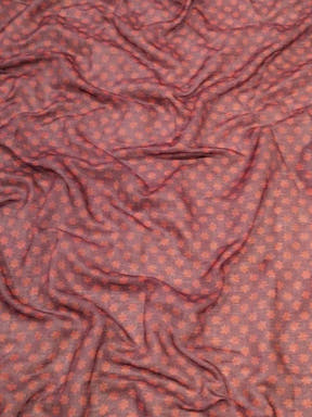 Close-up of fabric with intricate kalamkari print design