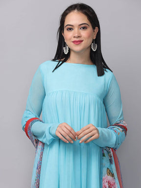 Close-up of powder blue dress with dupatta, smiling model