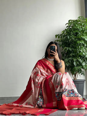Chic soft silk saree with red Gadwal border and floral Pochampally design