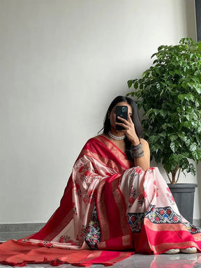 Chic soft silk saree with red Gadwal border and floral Pochampally design