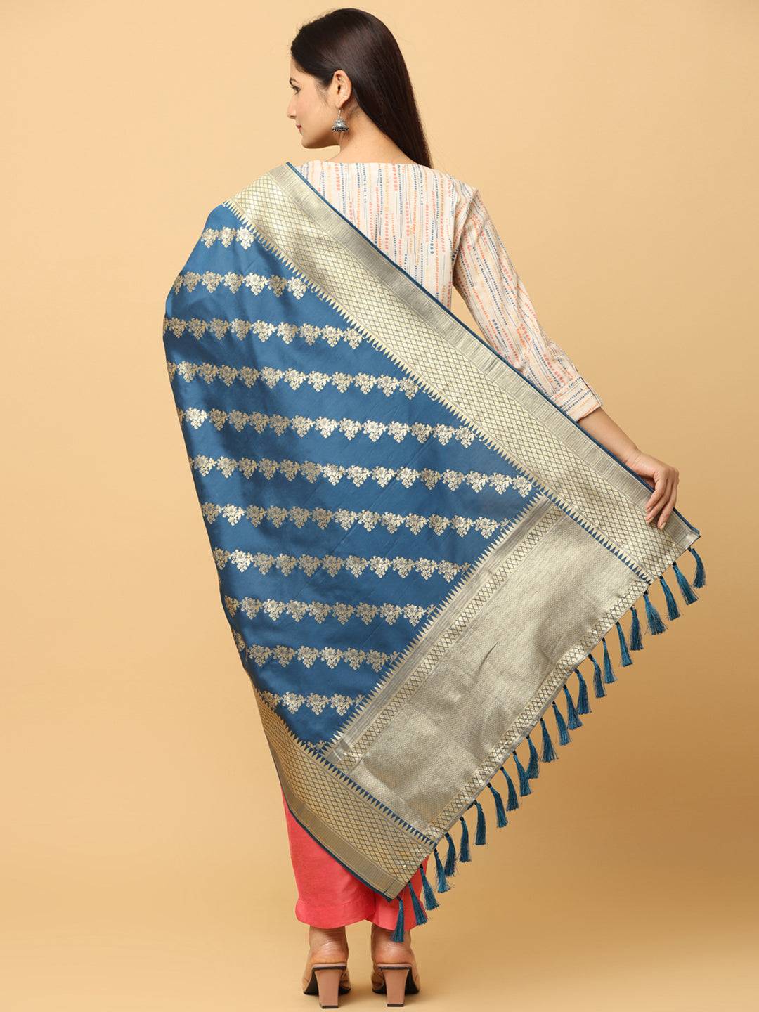 Back view of teal woven design dupatta with tassels