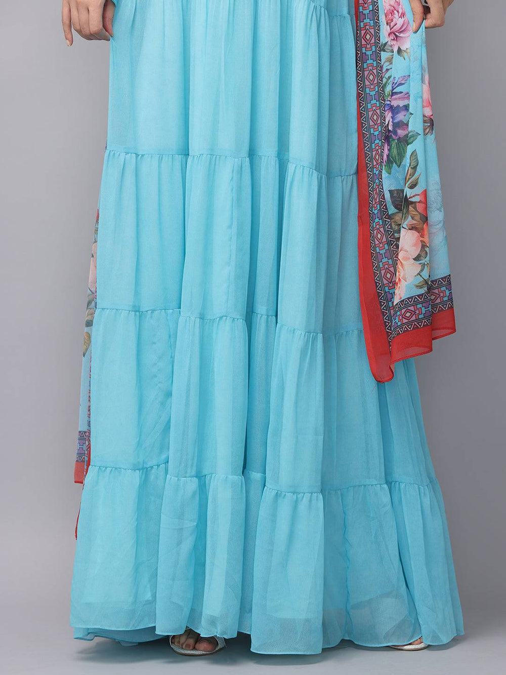 Detail of powder blue dress with floral dupatta