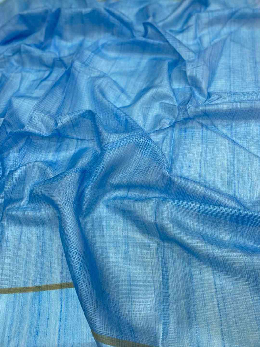 Blue satin Kota Doriya fabric with subtle texture