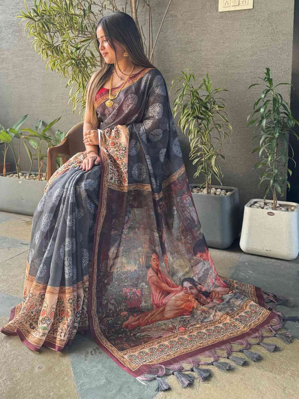 Grey saree showcasing Kalamkari print with detailed pallu