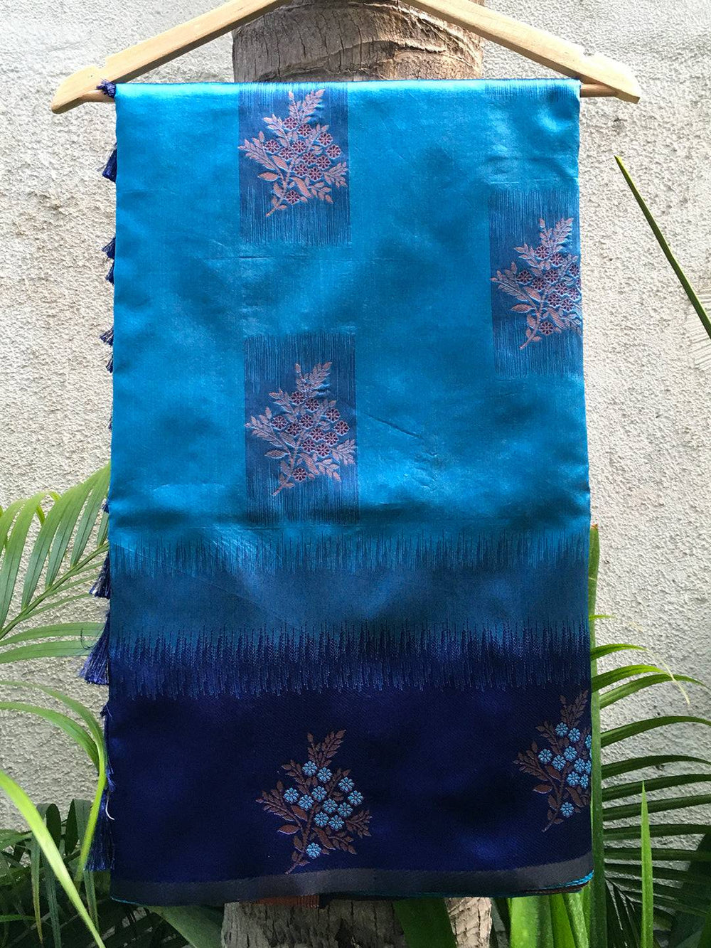 Close-up of Royal Blue Sami Banarasi Tussar Silk Saree on hanger