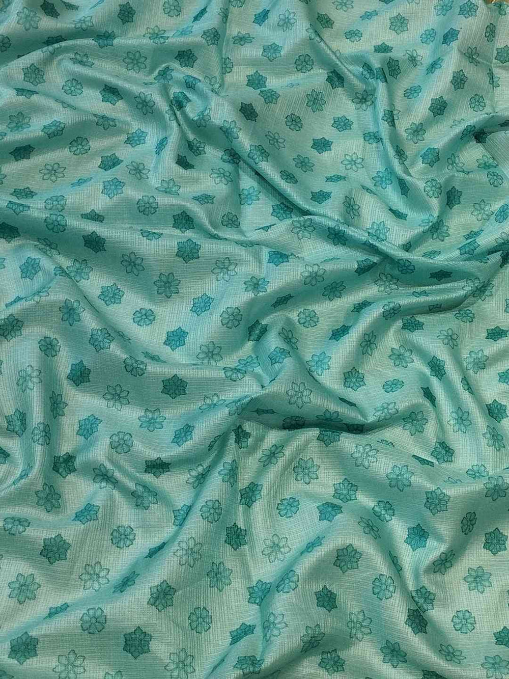 Fabric detail of Pink Kota Saree with floral motifs