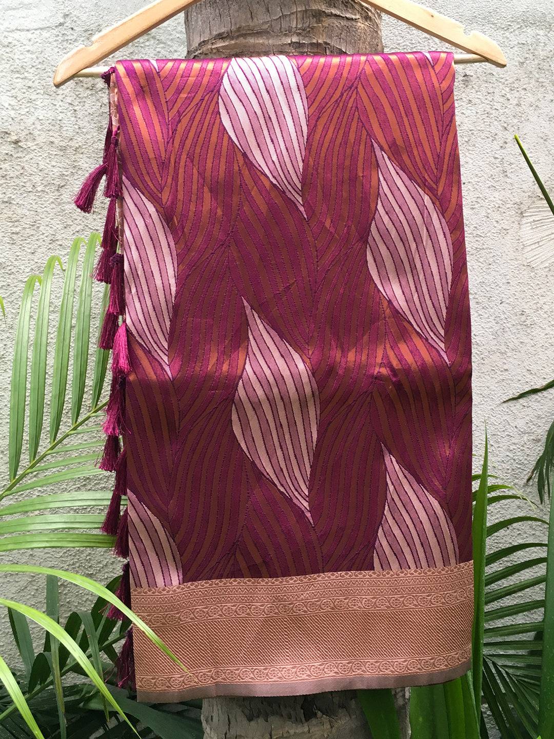 Cherry Tussar Silk Ikkat Saree Draped on Hanger