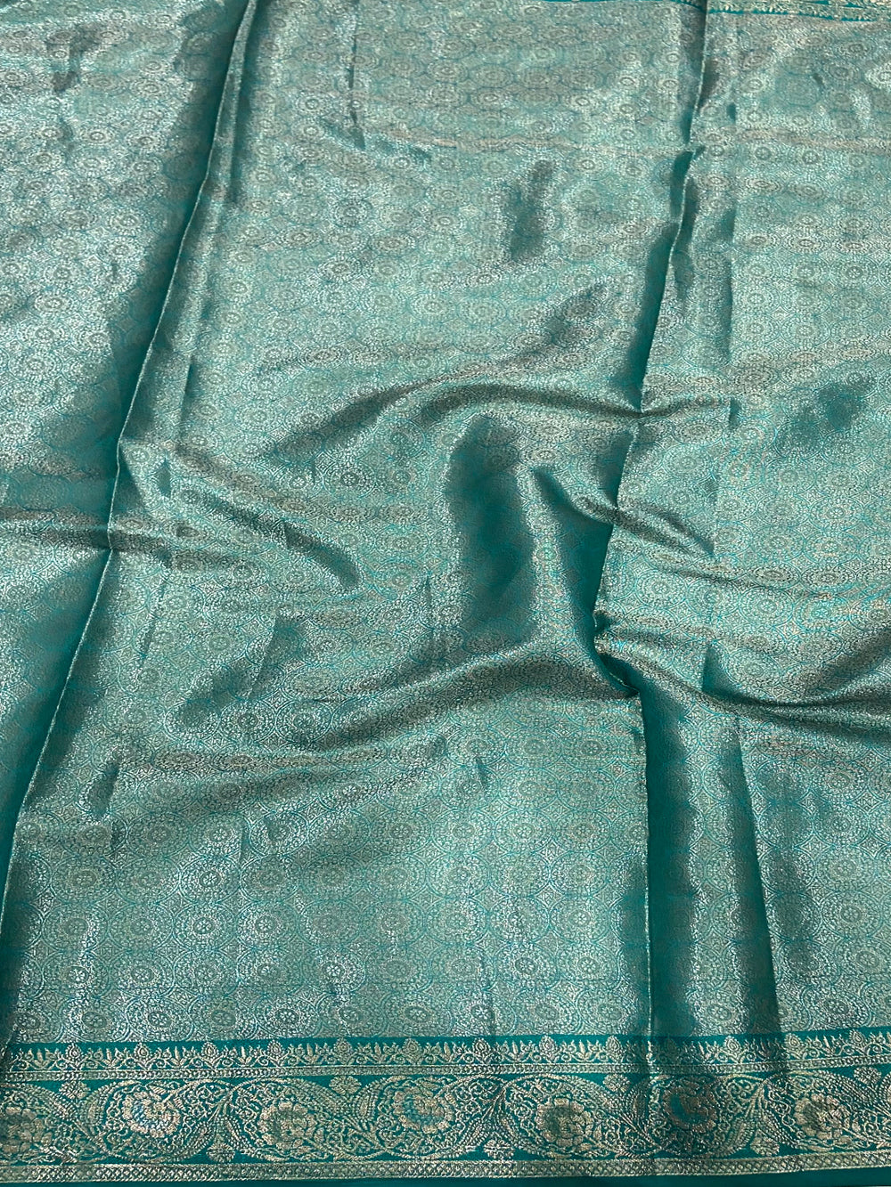 Elegant Teal Kora Tissue Saree