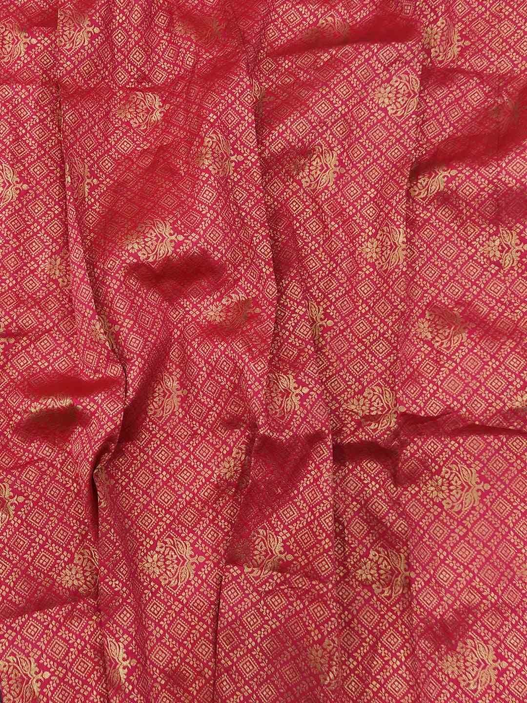 Red fabric with intricate gold thread weaving pattern