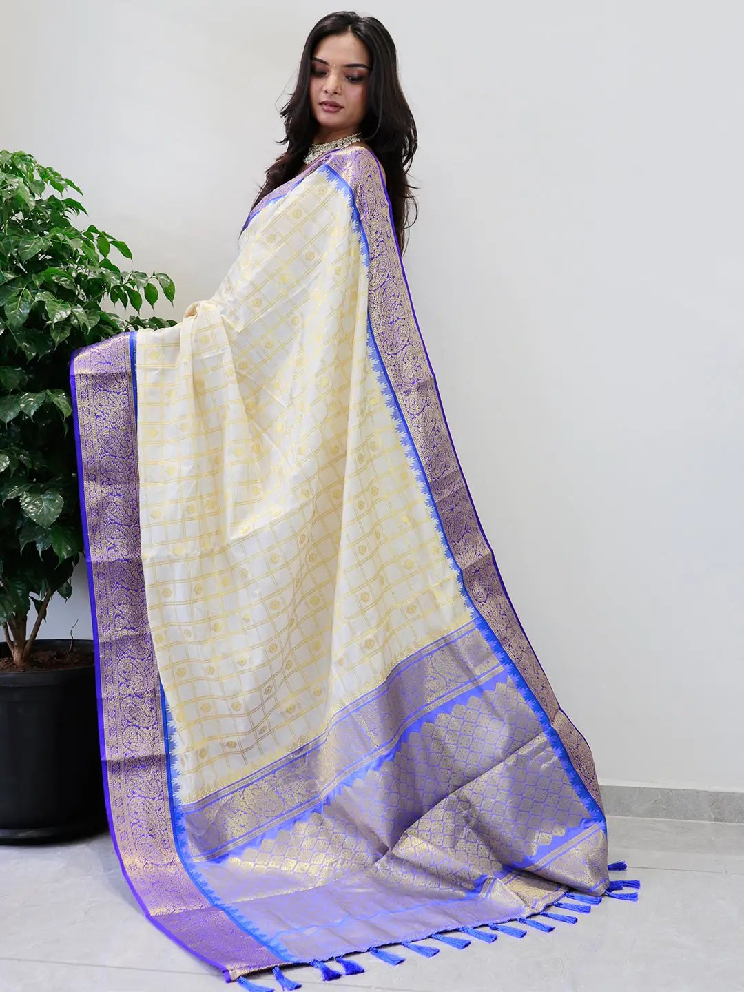 Soft silk Gadwal saree showcasing intricate temple border
