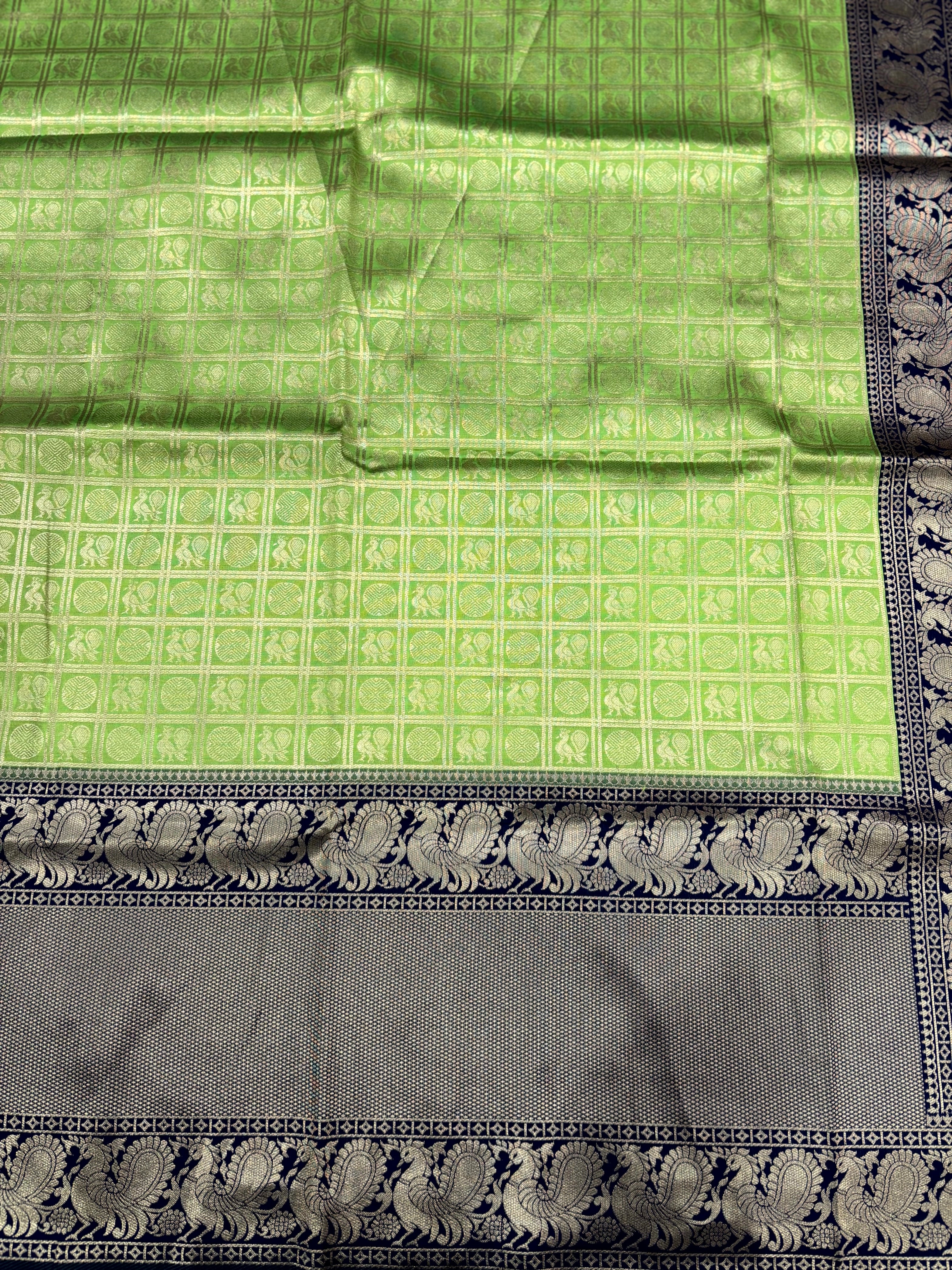 Green Silver Zari Butta Kanjivaram Silk Saree