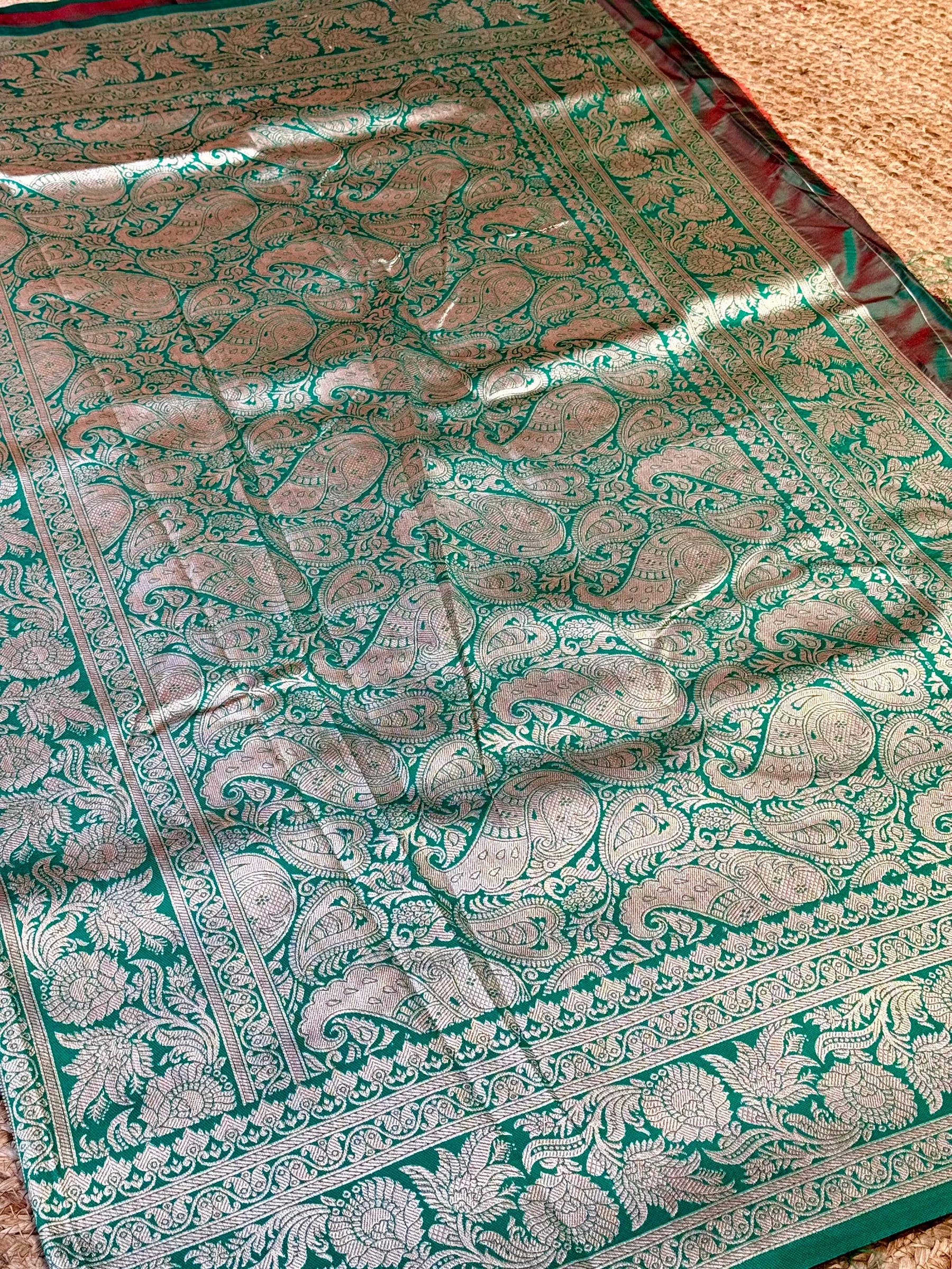 Green Silk Saree with Intricate Silver Floral Design