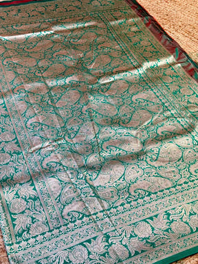 Green Silk Saree with Intricate Silver Floral Design