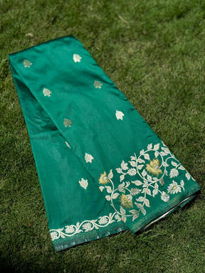 Emerald green silk saree with gold floral embroidery