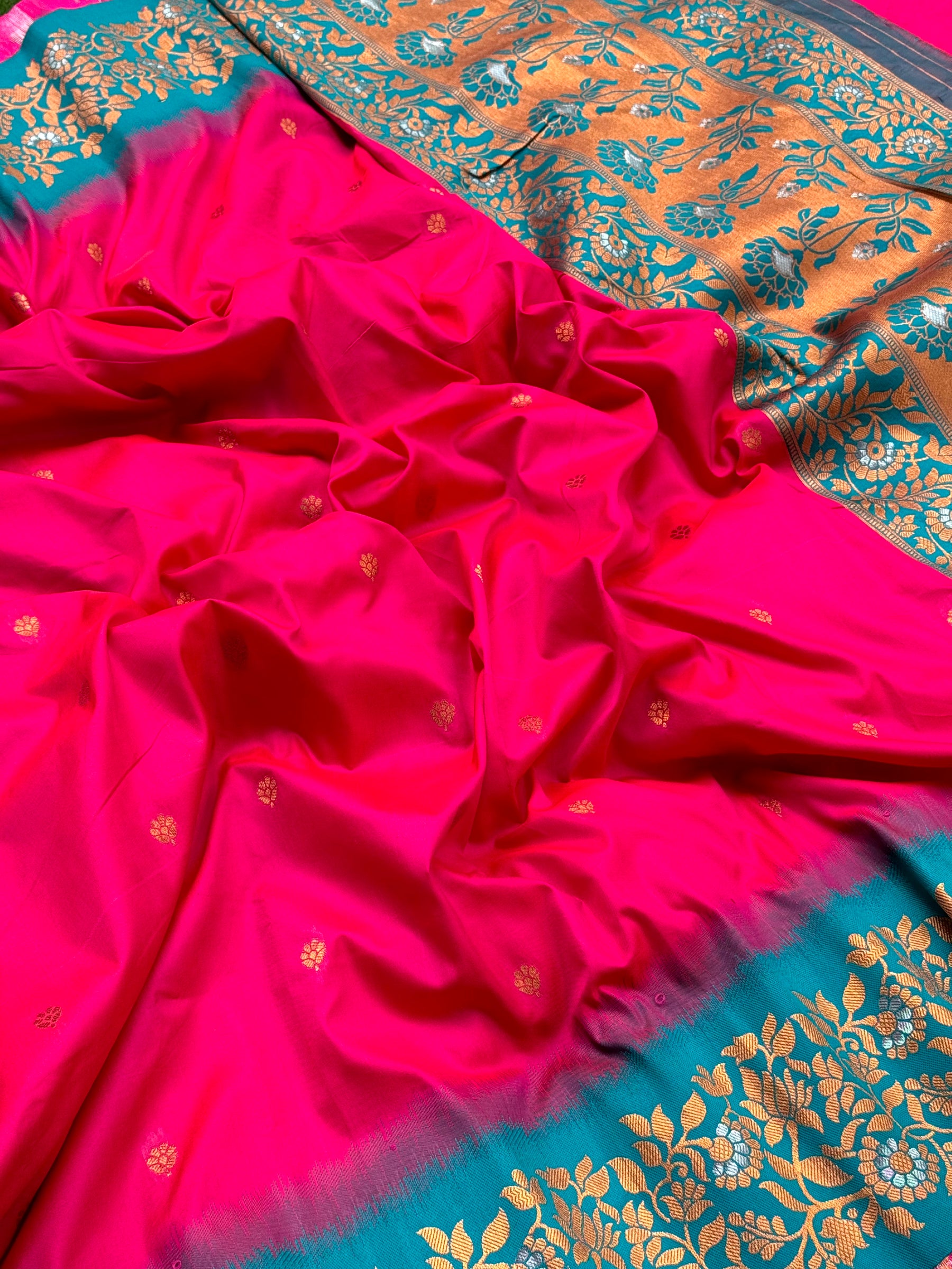 Close-up of Pink Silk Saree with Gold Floral Border