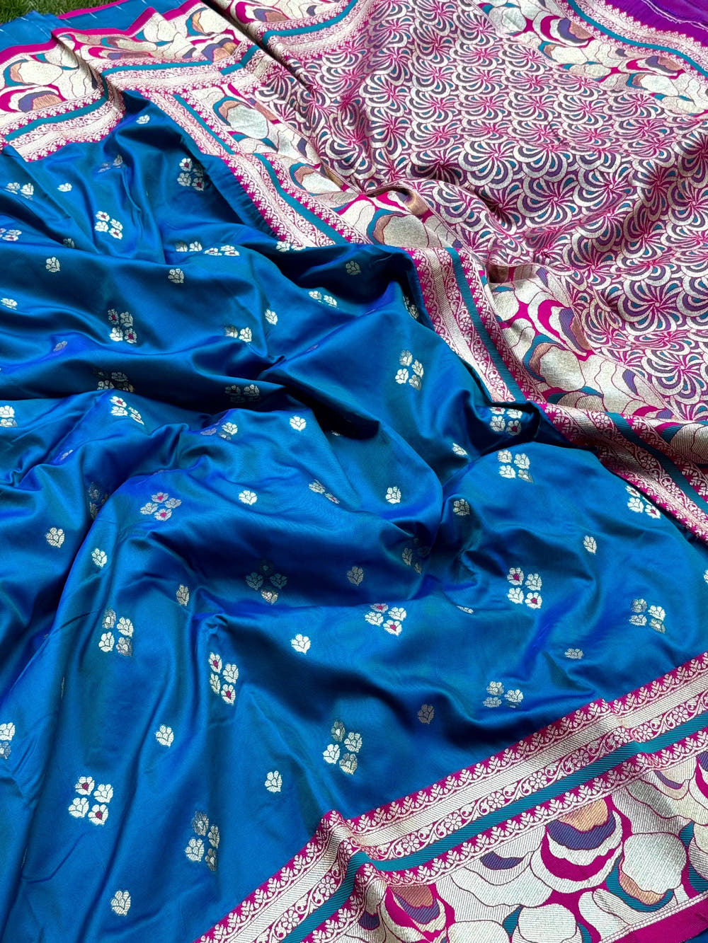 Pink and blue patterned silk saree with intricate border
