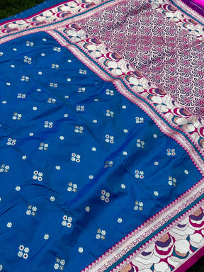 Blue silk saree with floral embroidery and decorative border